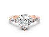 Rose gold Heart Cut Moissanite Solitaire with Side Baguettes and Channel Set Band