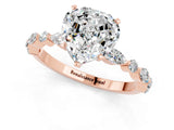 Rose gold Heart Cut Moissanite Solitaire with Side Stones on a Pavé Band and Four-Prong Setting_1