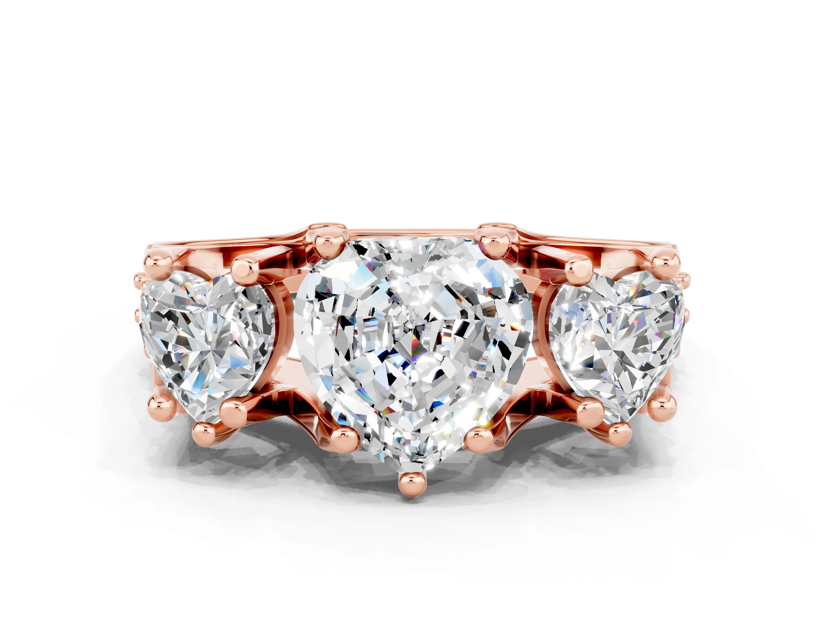 Rose gold Heart Cut Moissanite Three-Stone Ring with Channel Set Band and Four-Prong Setting