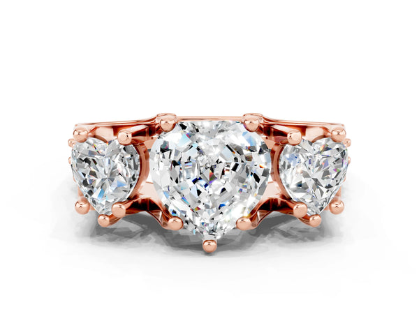 Rose gold Heart Cut Moissanite Three-Stone Ring with Channel Set Band and Four-Prong Setting