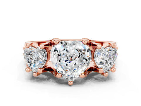 Rose gold Heart Cut Moissanite Three-Stone Ring with Channel Set Band and Four-Prong Setting