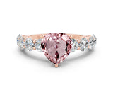 Rose gold Heart Cut Morganite Prong Setting with Side Stones on a Pave Band