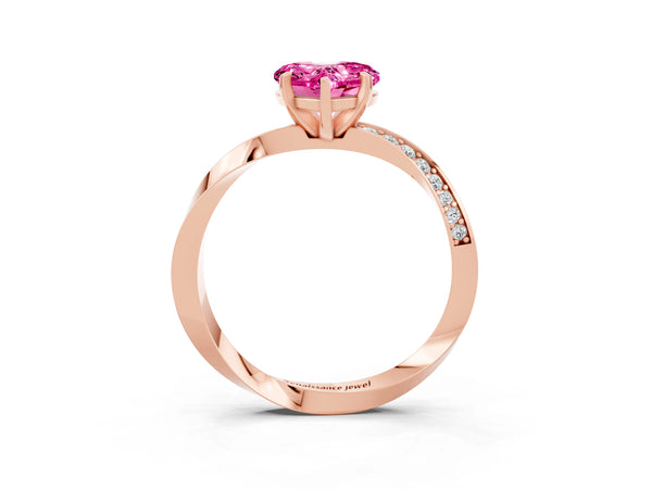 Rose gold Heart Cut Pink Sapphire Engagement Ring with Side Stone Accents and Four-Prong Setting