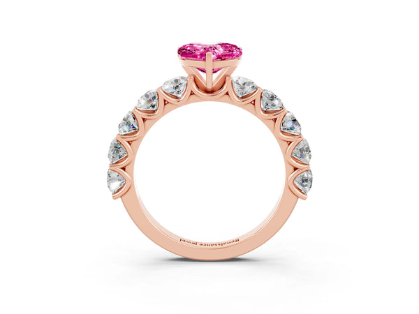 Rose gold Heart Cut Pink Sapphire Prong Setting with Side Stones on a Pave Band