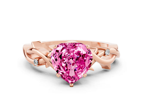 Rose gold Heart Cut Pink Sapphire Solitaire Ring with Twisted Band and Prong Setting