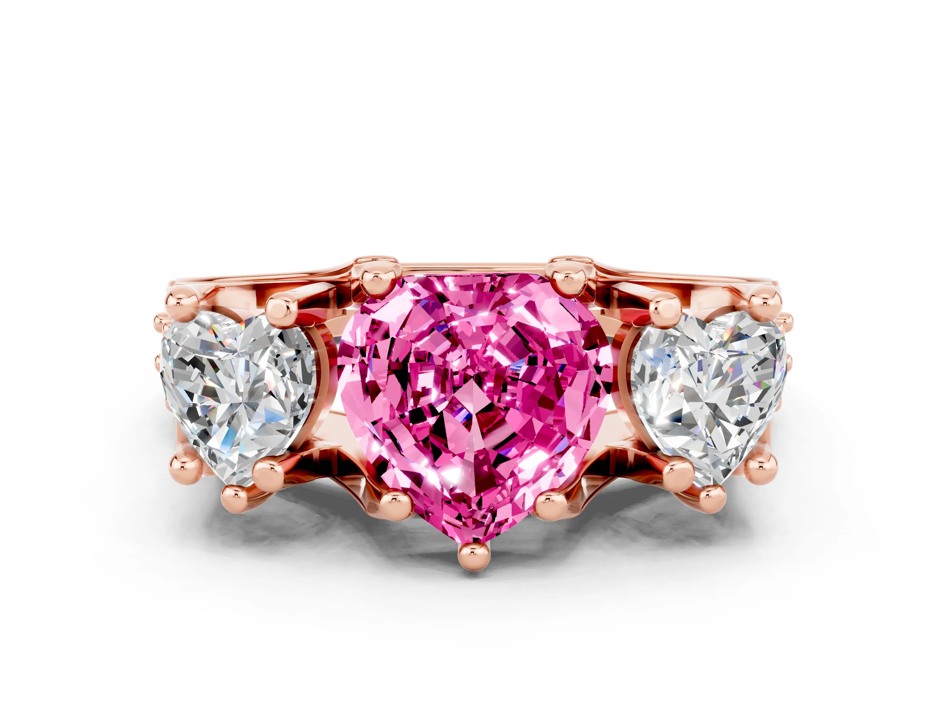 Rose gold Heart Cut Pink Sapphire Three-Stone Ring with Channel Set Band and Four-Prong Setting