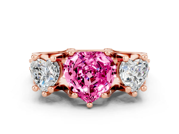 Rose gold Heart Cut Pink Sapphire Three-Stone Ring with Channel Set Band and Four-Prong Setting