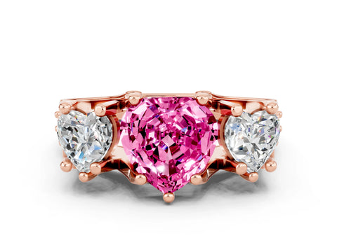Rose gold Heart Cut Pink Sapphire Three-Stone Ring with Channel Set Band and Four-Prong Setting