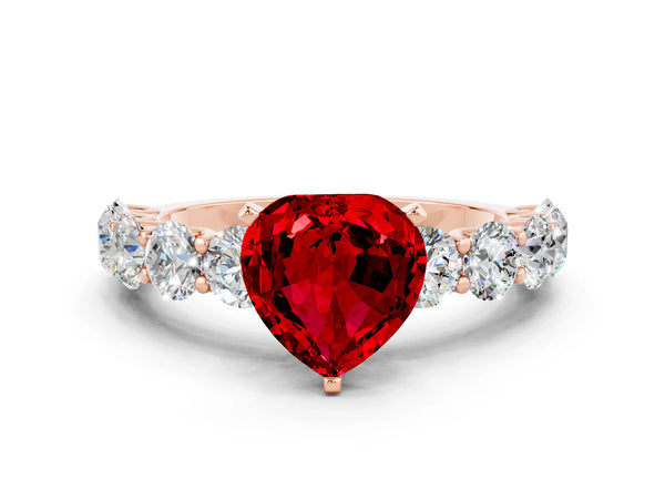 Rose gold Heart Cut Ruby Prong Setting with Side Stones on a Pave Band