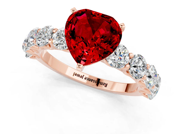 Rose gold Heart Cut Ruby Prong Setting with Side Stones on a Pave Band