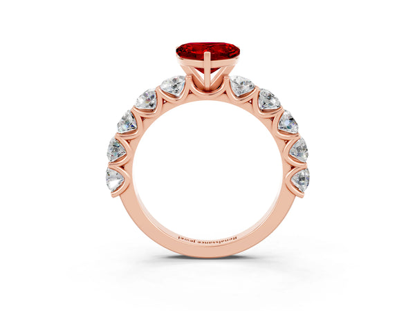 Rose gold Heart Cut Ruby Prong Setting with Side Stones on a Pave Band