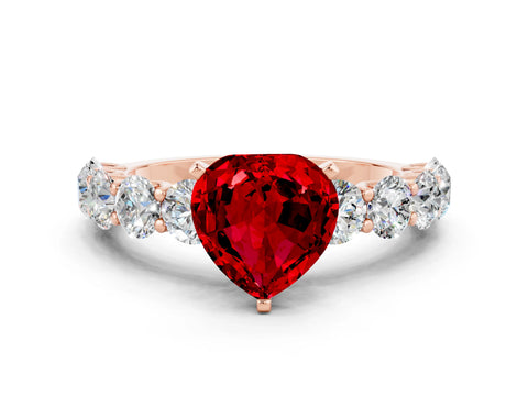 Rose gold Heart Cut Ruby Prong Setting with Side Stones on a Pave Band