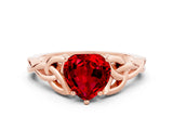 Rose gold Heart Cut Ruby Solitaire Engagement Ring with Celtic Knot Band and Four-Prong Setting