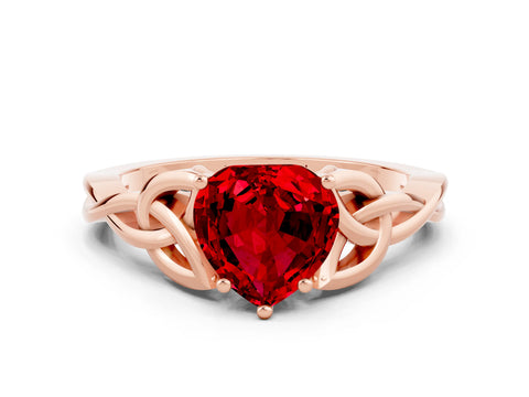 Rose gold Heart Cut Ruby Solitaire Engagement Ring with Celtic Knot Band and Four-Prong Setting