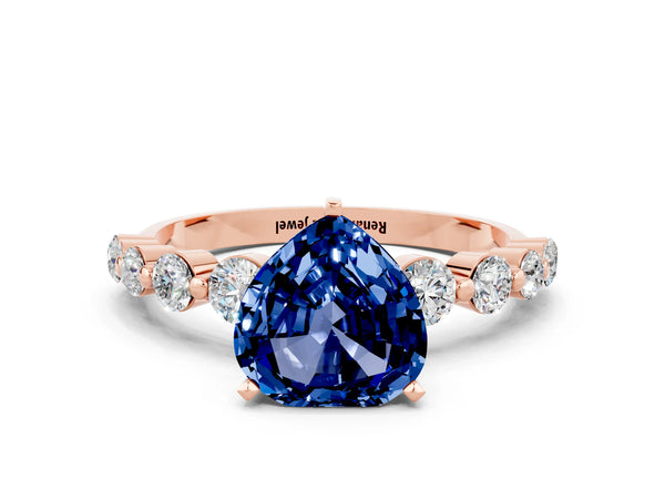 Rose gold Heart Cut Solitaire Blue Sapphire Ring with Pave Band and Four-Prong Setting