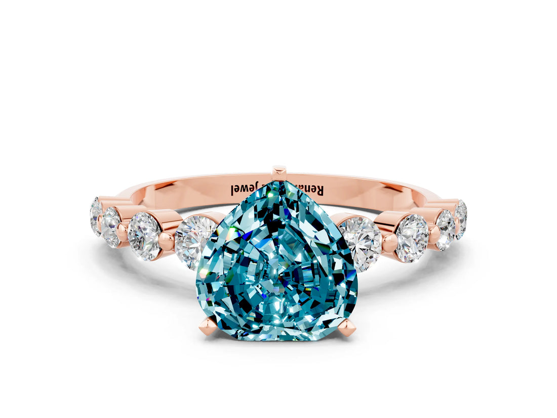 Rose gold Heart Cut Solitaire Blue Topaz Ring with Pave Band and Four-Prong Setting