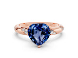 Rose gold Heart Cut Solitaire Diamond Engagement Ring with Twisted Pave Band and Four-Prong Setting