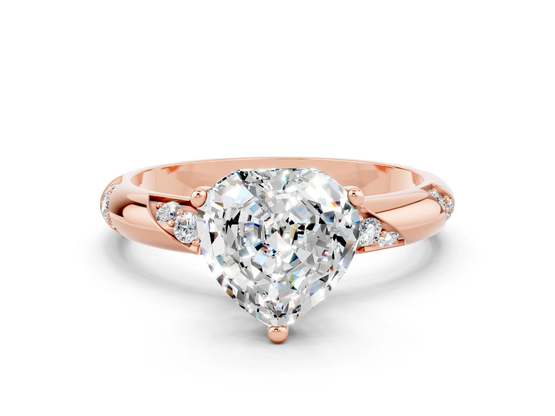 Rose gold Heart Cut Solitaire Diamond Engagement Ring with Twisted Pave Band and Four-Prong Setting