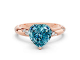 Rose gold Heart Cut Solitaire Diamond Engagement Ring with Twisted Pave Band and Four-Prong Setting
