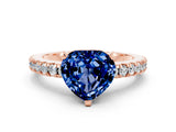 Rose gold Heart Cut Solitaire Diamond with Pavé Band and Four-Prong Setting