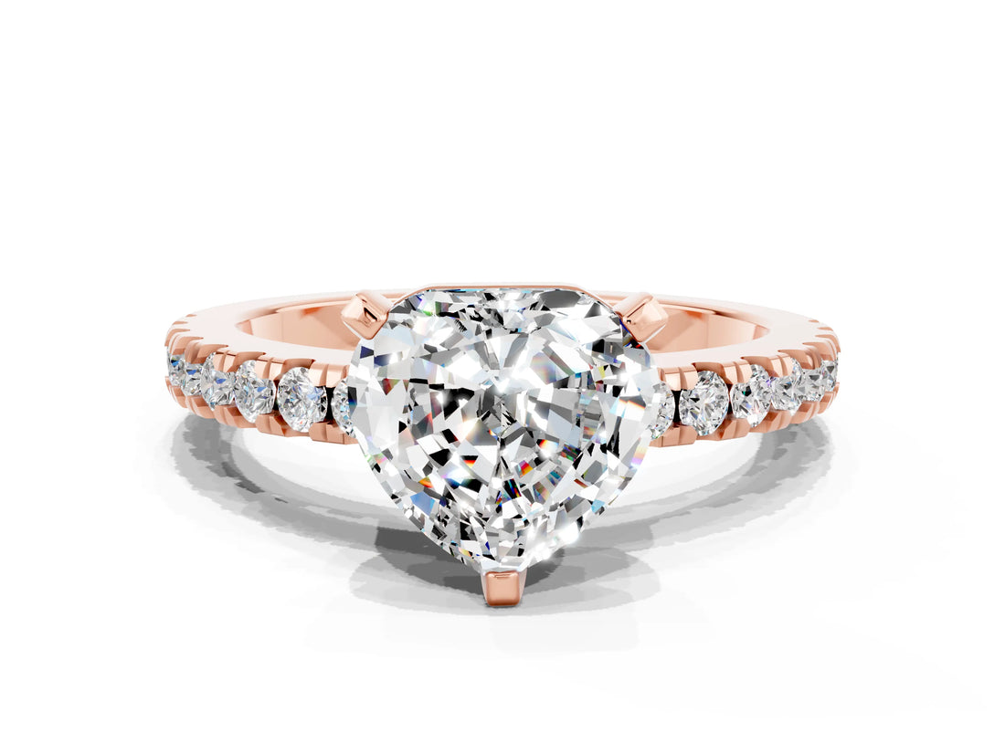 Rose gold Heart Cut Solitaire Diamond with Pavé Band and Four-Prong Setting