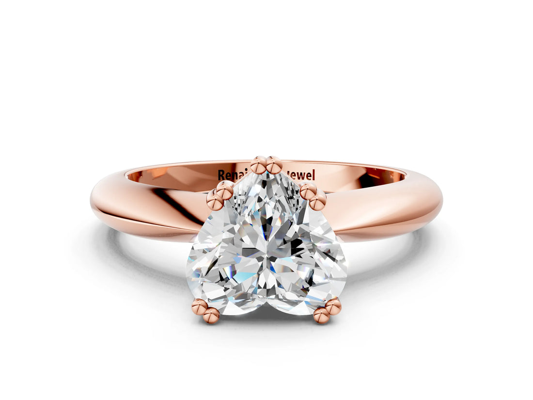 Rose gold Heart Cut Solitaire Engagement Ring with Tapered Band and Four-Prong Setting
