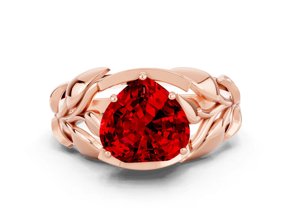 Rose gold Heart Cut Ruby Leaf-Inspired Engagement Ring with Round Accents and Prong Setting