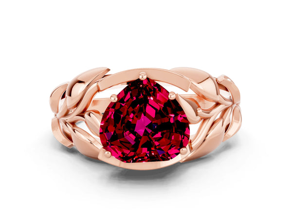 Rose gold Heart Cut Garnet Leaf-Inspired Engagement Ring with Round Accents and Prong Setting