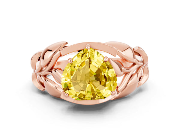 Rose gold Heart Cut Yellow Sapphire Leaf-Inspired Engagement Ring with Round Accents and Prong Setting