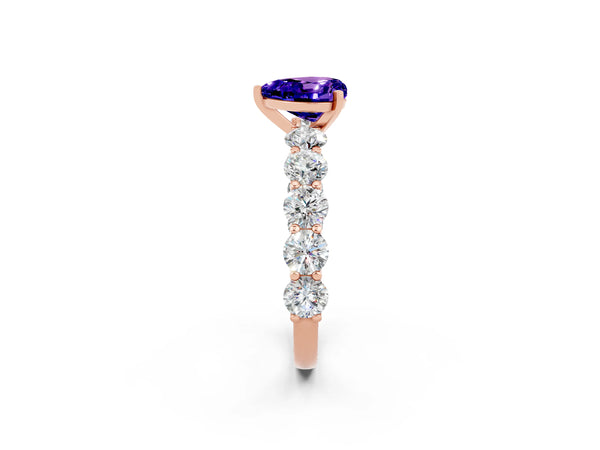 Rose gold Heart Cut Tanzanite Prong Setting with Side Stones on a Pave Band
