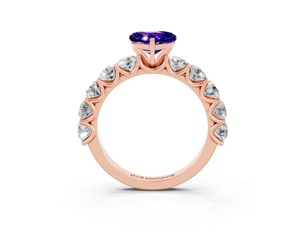 Rose gold Heart Cut Tanzanite Prong Setting with Side Stones on a Pave Band
