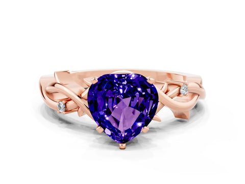 Rose gold Heart Cut Tanzanite Solitaire Ring with Twisted Band and Prong Setting