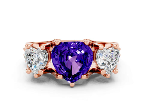 Rose gold Heart Cut Tanzanite Three-Stone Ring with Channel Set Band and Four-Prong Setting