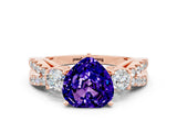 Rose gold Heart Cut Tanzanite Three-Stone Ring with Pavé Split Shank and Four-Prong Setting