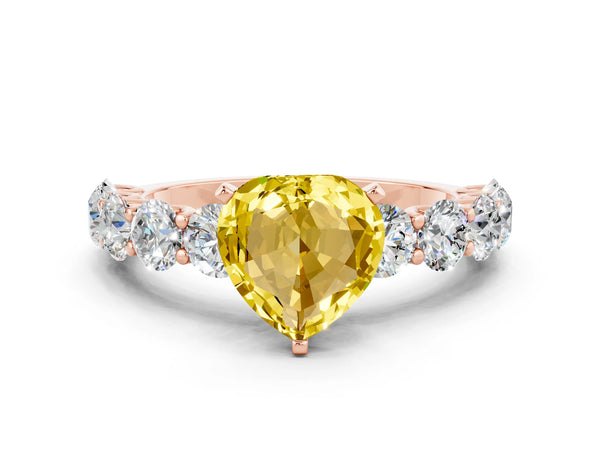 Rose gold Heart Cut Yellow Sapphire Prong Setting with Side Stones on a Pave Band
