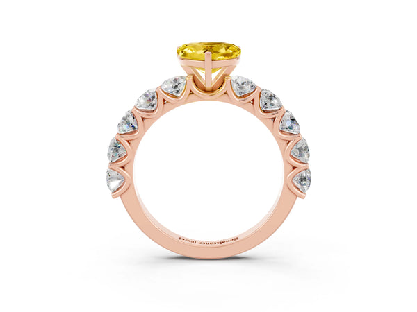 Rose gold Heart Cut Yellow Sapphire Prong Setting with Side Stones on a Pave Band