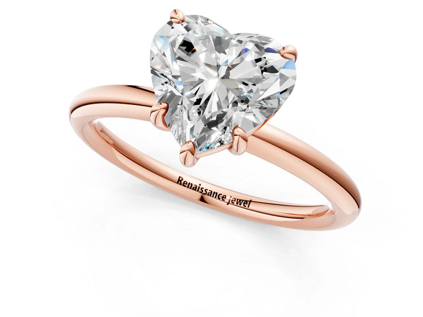 Rose gold Heart Solitaire Diamond Ring with Four-Prong Setting on a Plain Band