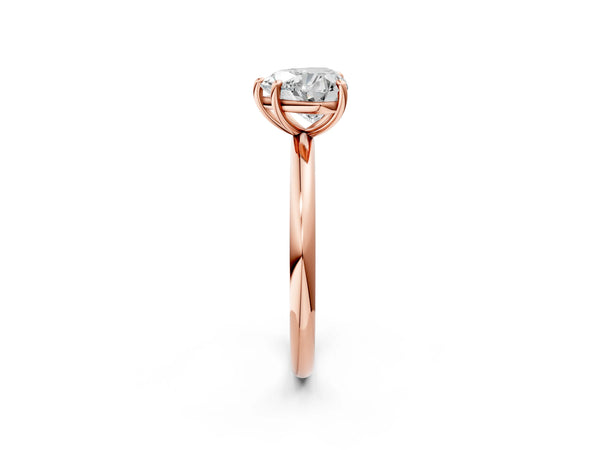 Rose gold Heart Solitaire Diamond Ring with Four-Prong Setting on a Plain Band