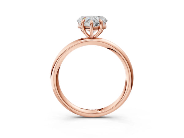 Rose gold Heart Solitaire Diamond Ring with Four-Prong Setting on a Plain Band
