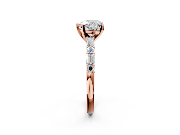 Rose gold Heart Cut Diamond Solitaire with Side Baguettes and Channel Set Band