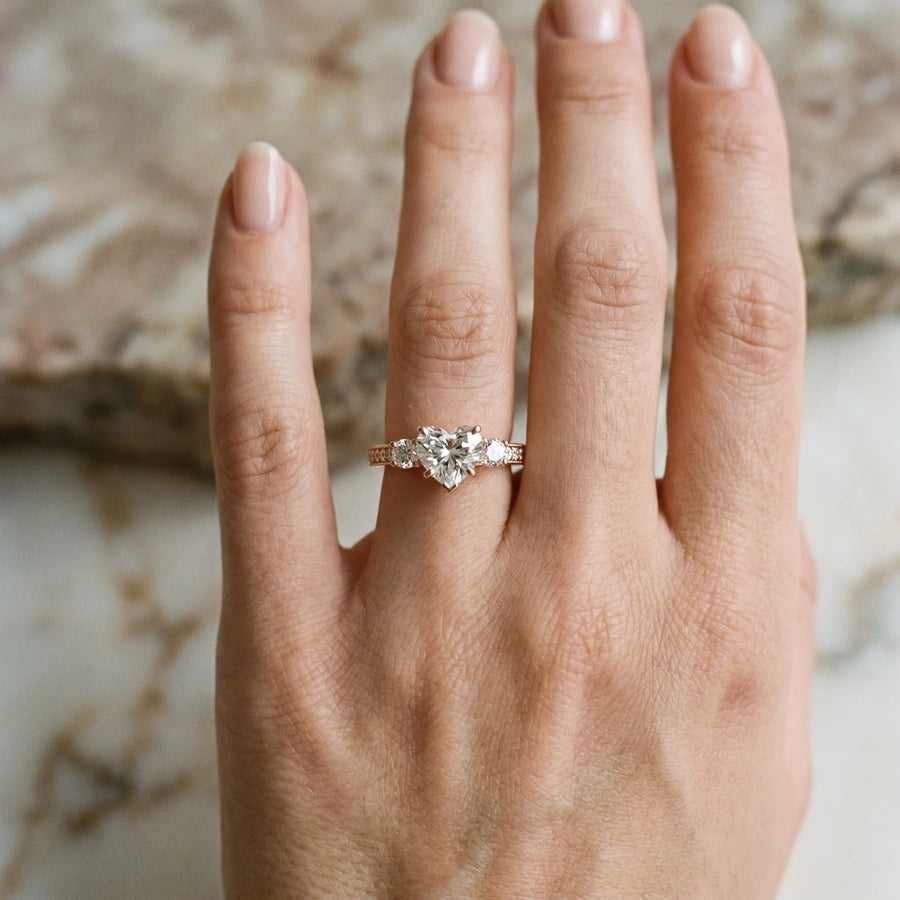 Rose gold Heart Three-Stone Diamond Ring with Pavé Band and Four-Prong Setting