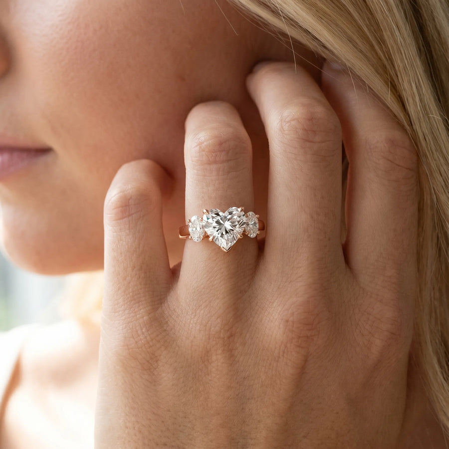 Rose gold Heart Three-Stone Diamond Ring with Prong Setting on a Classic Band