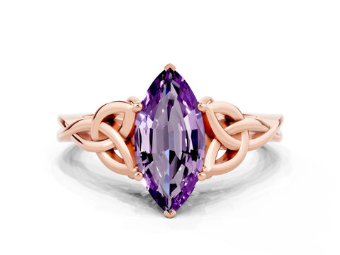 Rose gold Marquise Cut Amethyst Solitaire Engagement Ring with Celtic Knot Band and Four-Prong Setting