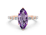 Rose gold Marquise Cut Amethyst Solitaire with Side Stones on a Pavé Band and Four-Prong Setting