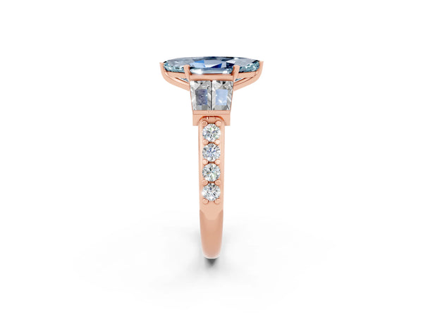 Rose gold Marquise Cut Aquamarine Engagement Ring with Baguette Side Stones and Channel Set Band