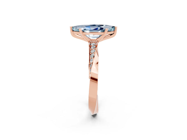 Rose gold Marquise Cut Aquamarine Engagement Ring with Side Stone Accents and Four-Prong Setting