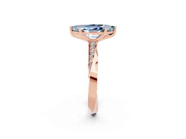 Rose gold Marquise Cut Aquamarine Engagement Ring with Side Stone Accents and Four-Prong Setting