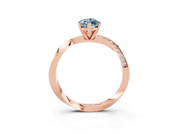 Rose gold Marquise Cut Aquamarine Engagement Ring with Side Stone Accents and Four-Prong Setting