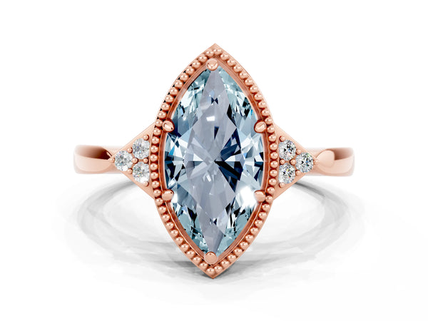 Rose gold Marquise Cut Aquamarine Halo Ring with Tapered Band and Four-Prong Setting