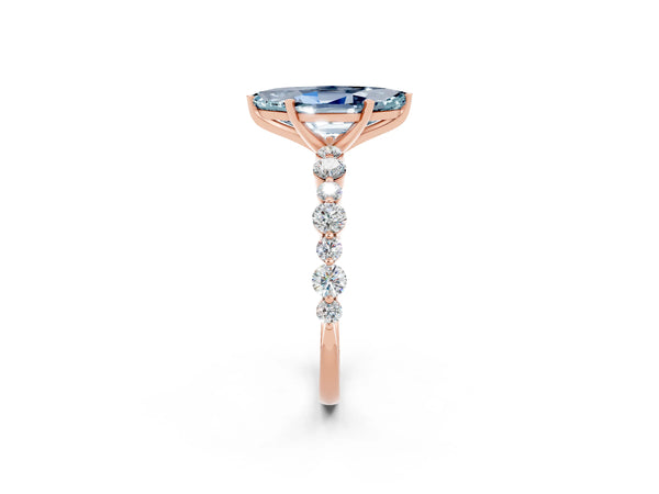 Rose gold Marquise Cut Aquamarine Prong Set Engagement Ring with Pavé Band